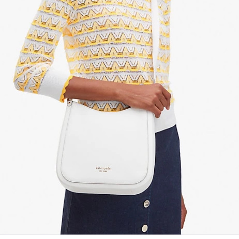 Kate Spade White Crossbody Bag with Flap Closure and Metallic Hardware
